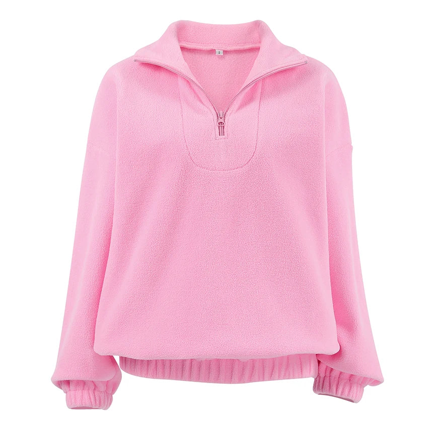 Women's pink textured pullover with stand collar and quarter-zip front