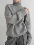 Women's cream turtleneck sweater with ribbed trims