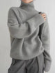 Women's cream turtleneck sweater with ribbed trims
