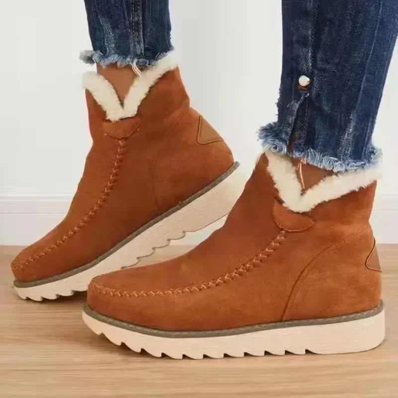 Women's ankle boots with light trim and flat ridged soles