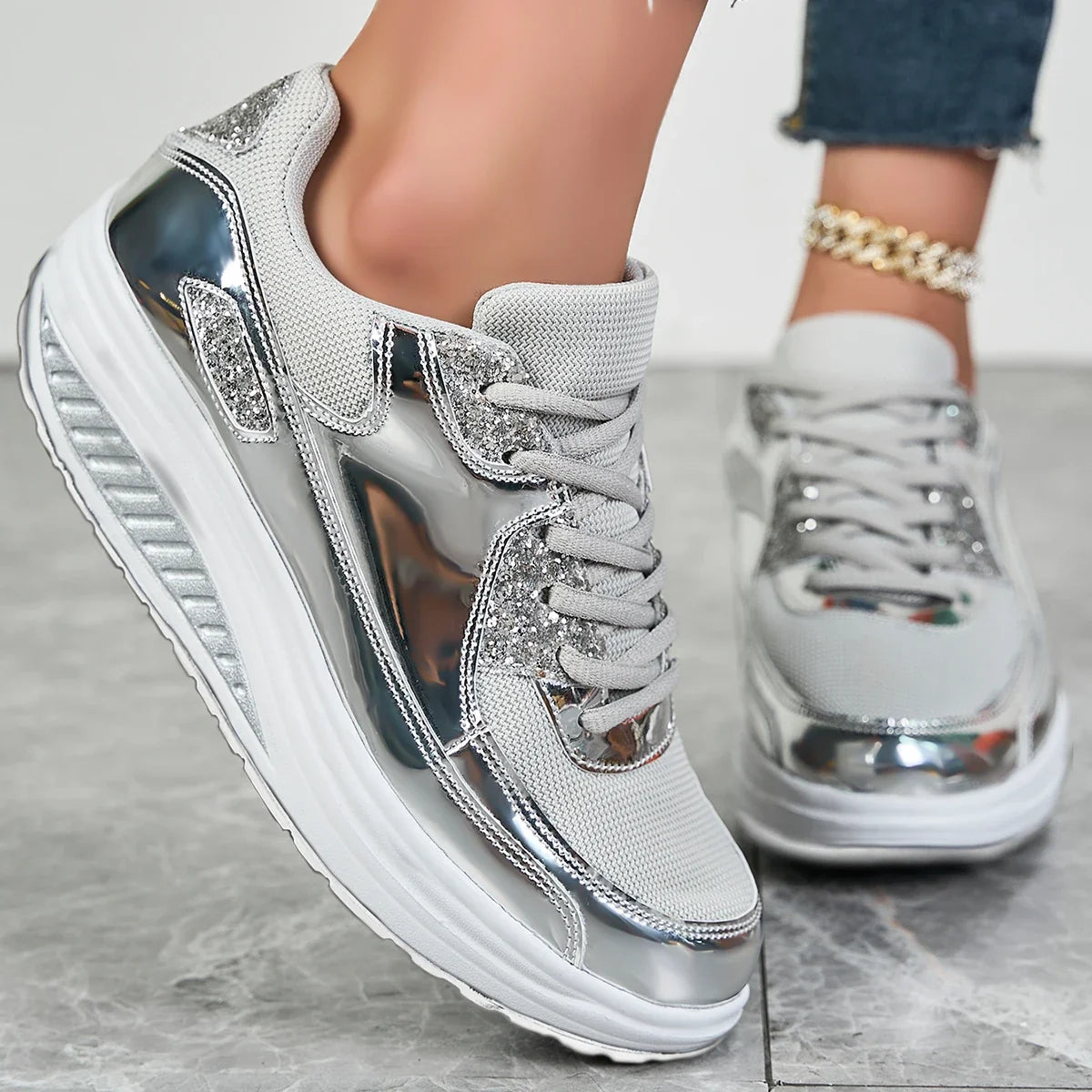 Metallic lace-up sneakers with sequined panels and platform soles