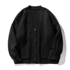Women's oversized ribbed V-neck cardigan with buttons and patch pockets