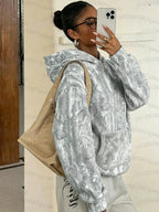 Women's oversized camouflage hoodie with hood and front kangaroo pocket