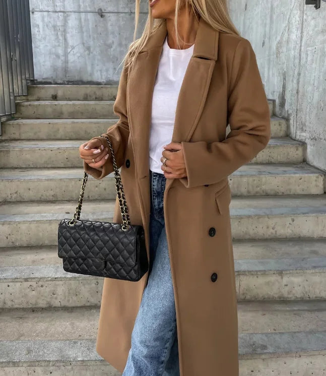 Women's long belted trench coat with notched lapels and double-breasted buttons