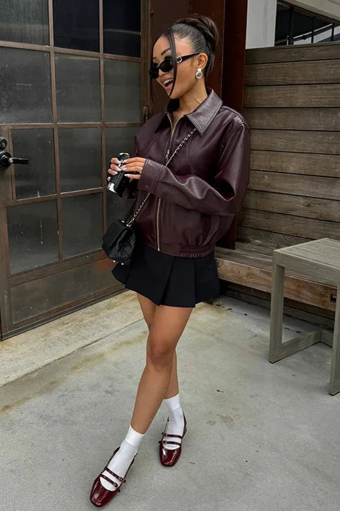 Women's wine cropped bomber jacket with long sleeves and zip fastening
