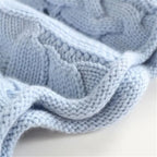 Women's textured cable knit turtleneck sweater with long sleeves