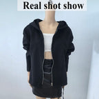 Women's hooded zip jacket with long sleeves and front pockets in beige and black