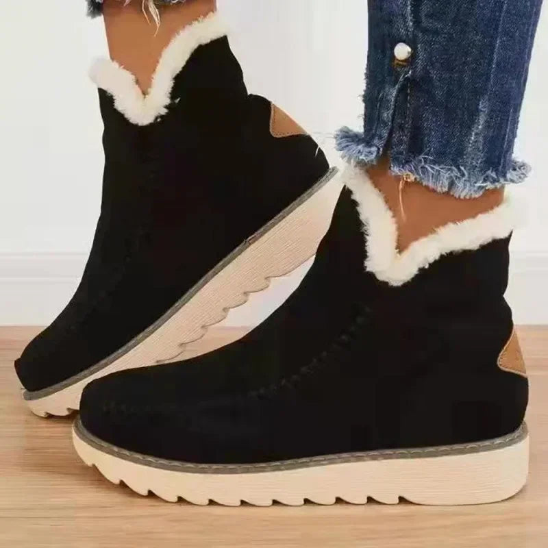 Women's ankle boots with light trim and flat ridged soles