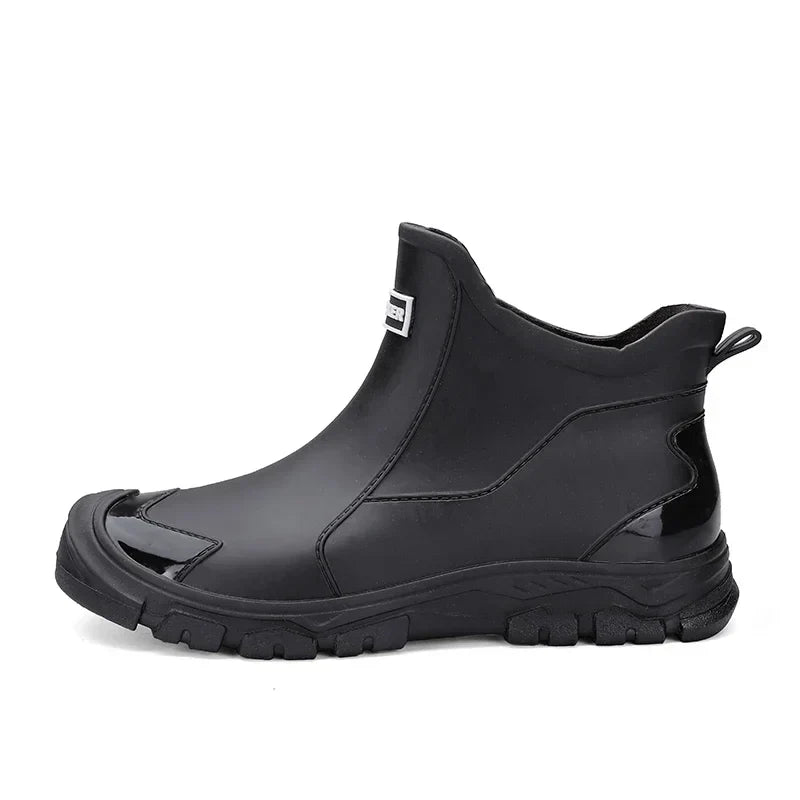 Women's Chelsea-style ankle rain boots with round toes and lugged soles