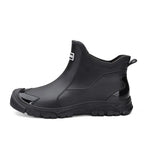 Women's Chelsea-style ankle rain boots with round toes and lugged soles