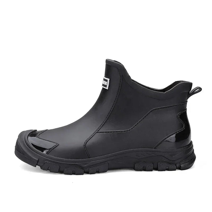 Women's Chelsea-style ankle rain boots with round toes and lugged soles
