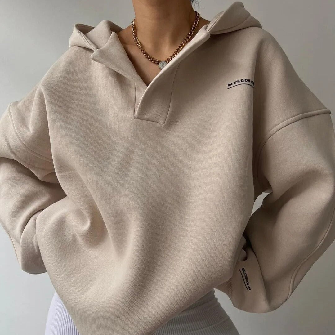 Women's oversized hoodie with attached hood and V-neck opening