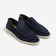 Men's slip-on loafers with stitched trim and contrast soles