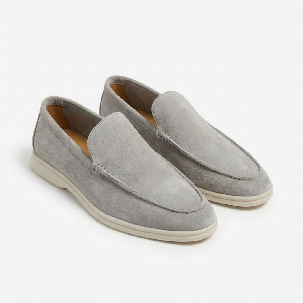 Men's slip-on loafers with stitched trim and contrast soles