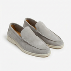 Men's slip-on loafers with stitched trim and contrast soles