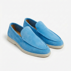 Men's slip-on loafers with stitched trim and contrast soles