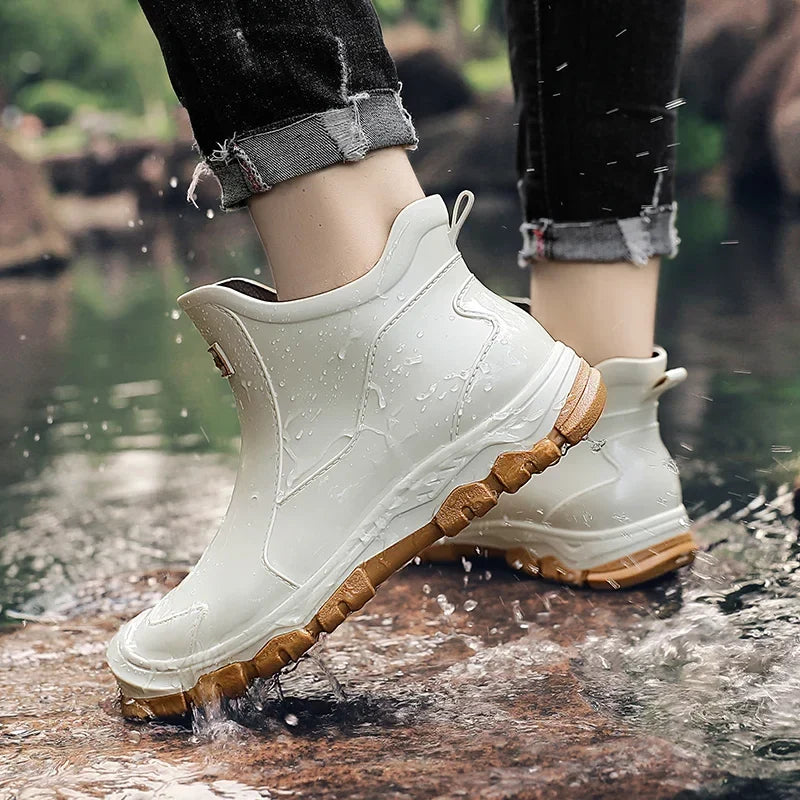 Women's Chelsea-style ankle rain boots with round toes and lugged soles