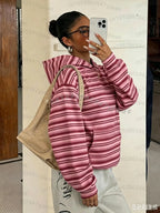 Women's oversized camouflage hoodie with hood and front kangaroo pocket