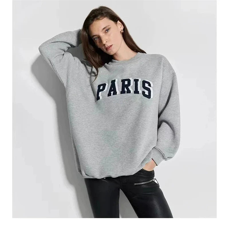 Women's crew-neck sweatshirt with long sleeves and embroidered front design