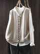 Women's sleeveless knit vest with V-neck and colorful buttons
