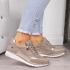 Women's low-top sneakers with lace-up fronts, side zips and perforated panels