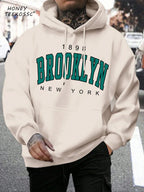 Men's long-sleeve graphic hoodie with drawstring hood and kangaroo pocket
