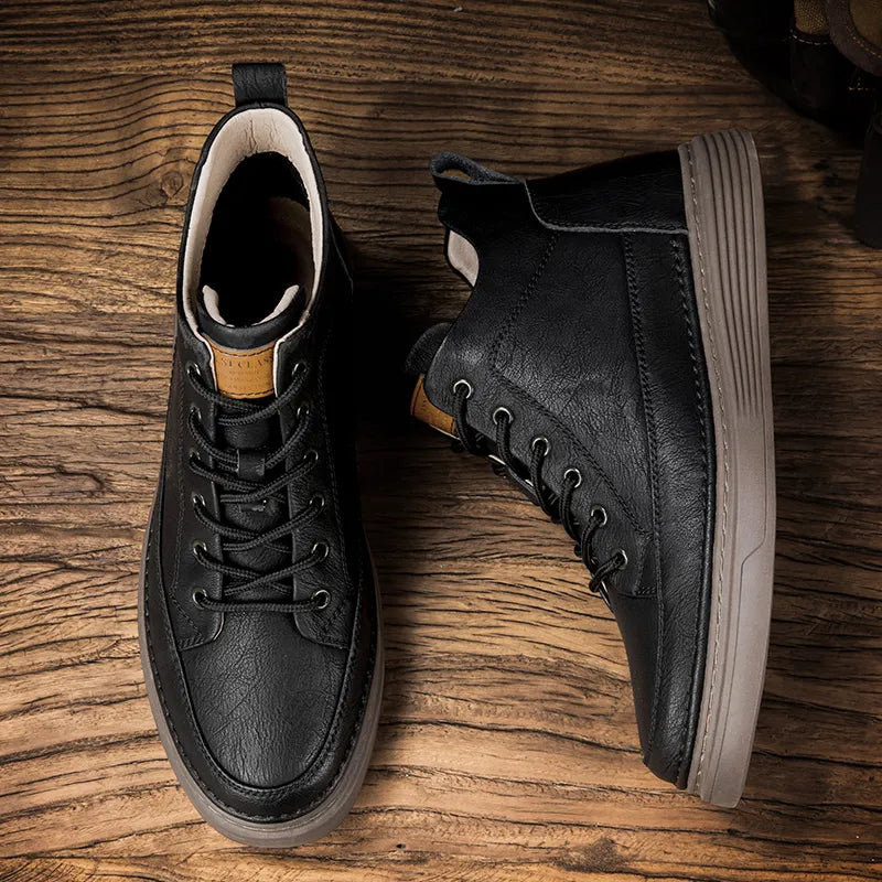 Men's lace-up ankle boots with stitched panels and platform sole