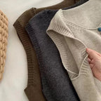 Sleeveless knit vest with scoop neck and multicolour front buttons