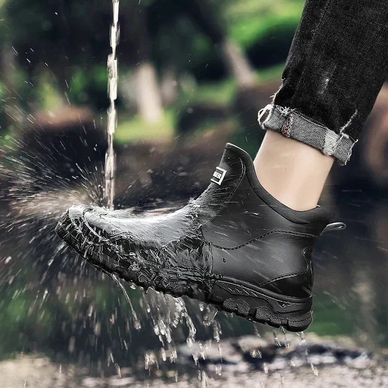 Women's Chelsea-style ankle rain boots with round toes and lugged soles