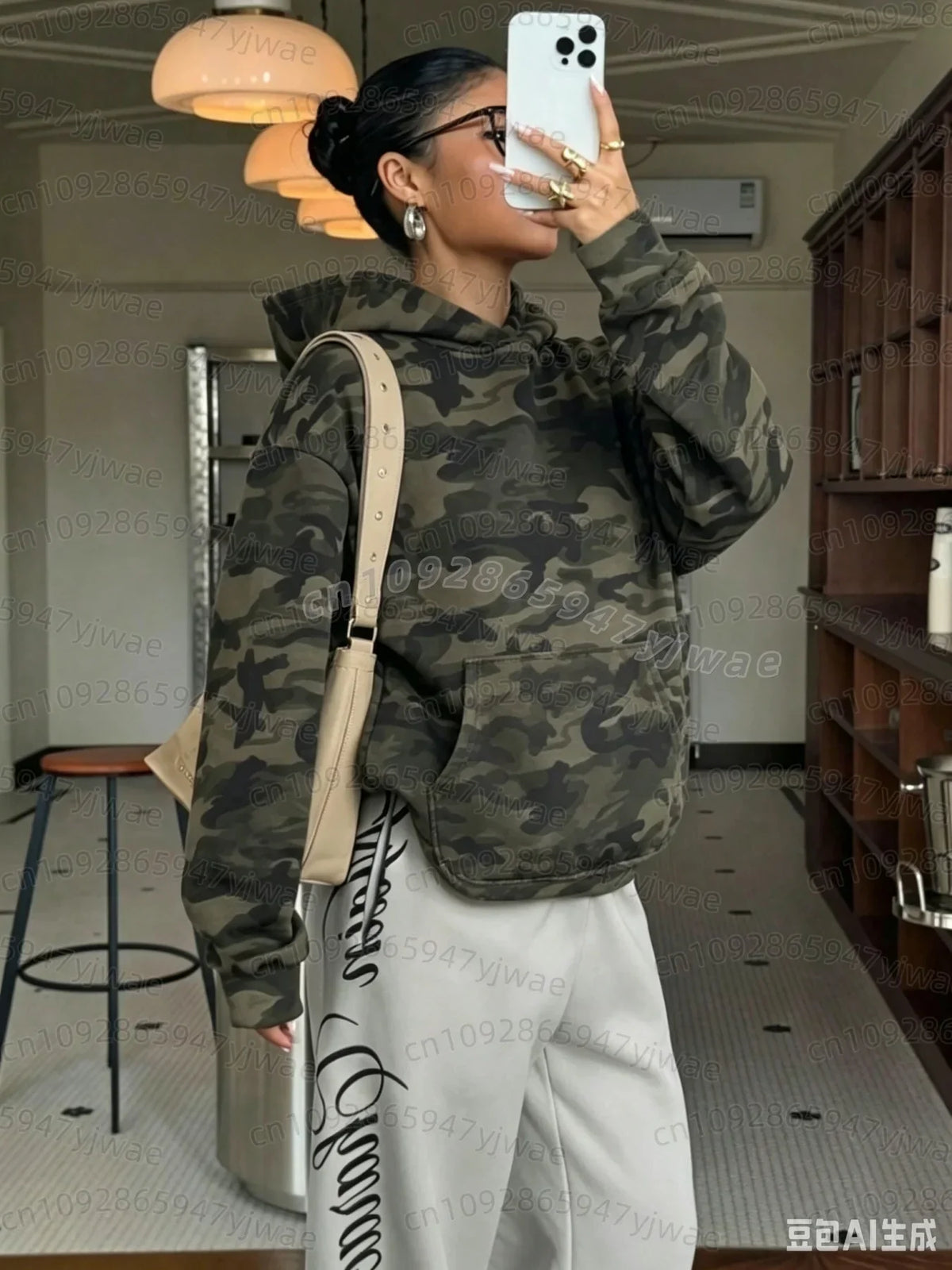 Women's oversized camouflage hoodie with hood and front kangaroo pocket