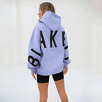 Women's graphic print hoodie with hood and bold back lettering