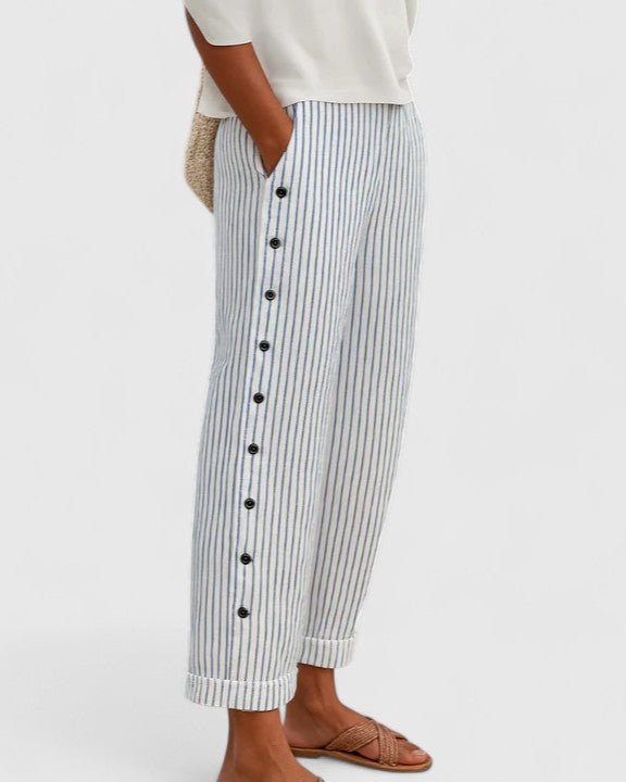 Women's striped cropped trousers with side buttons and turned cuffs