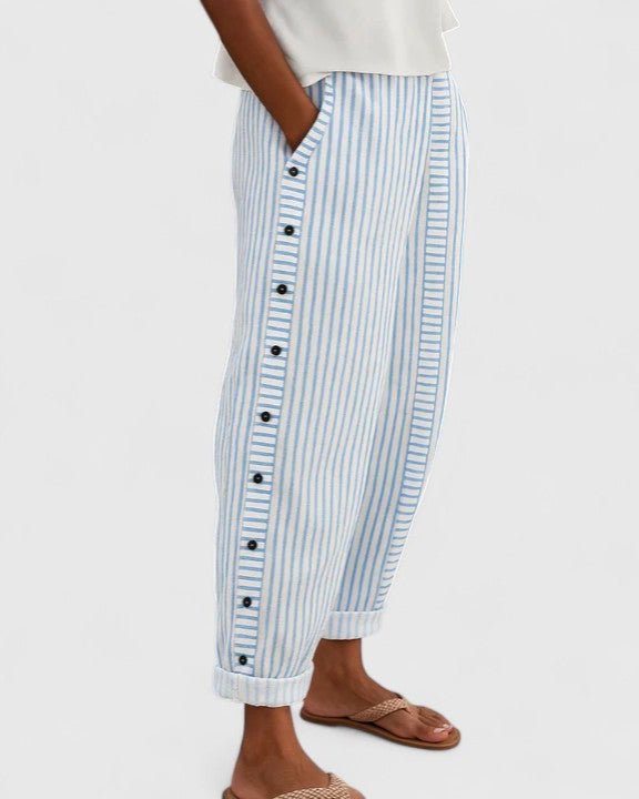 Women's striped cropped trousers with side buttons and turned cuffs