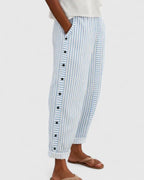 Women's striped cropped trousers with side buttons and turned cuffs
