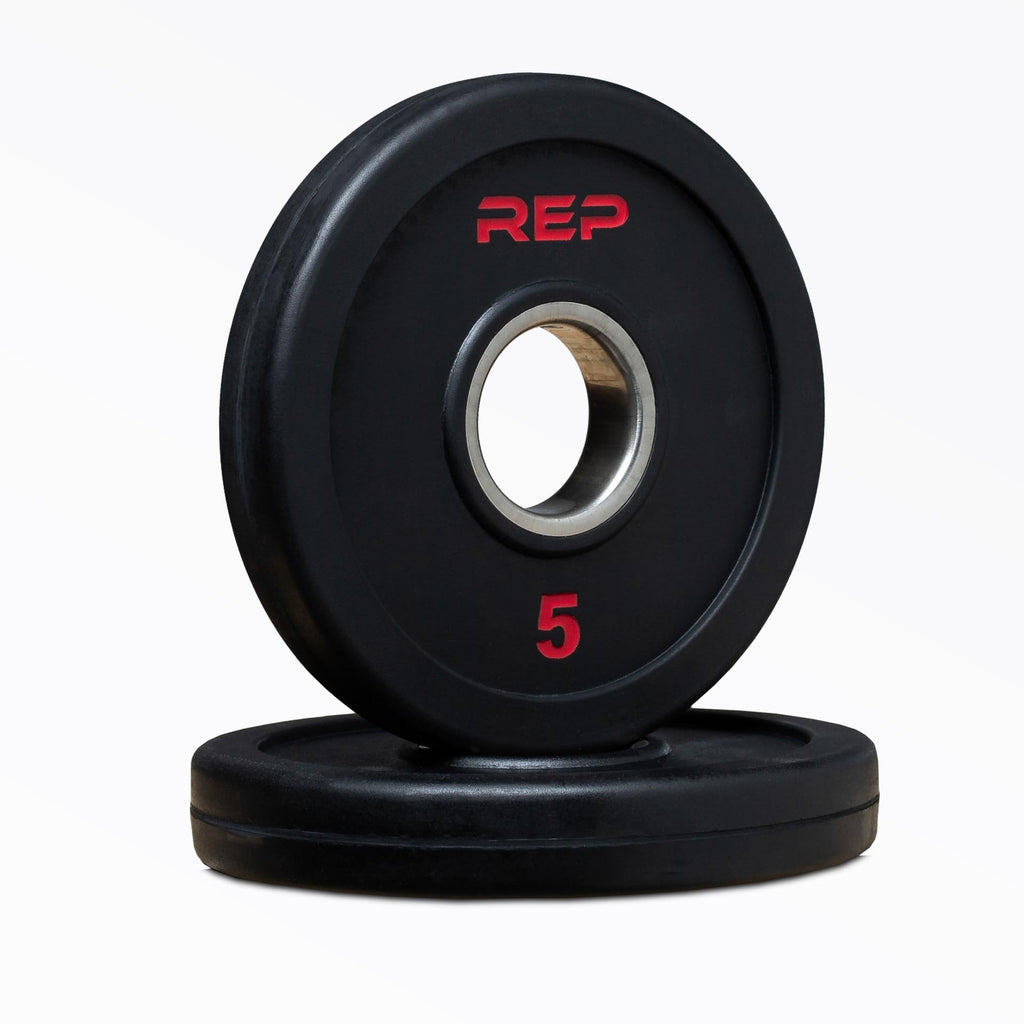 Black rubber coated Olympic weight plate marked 45 with three grip handles