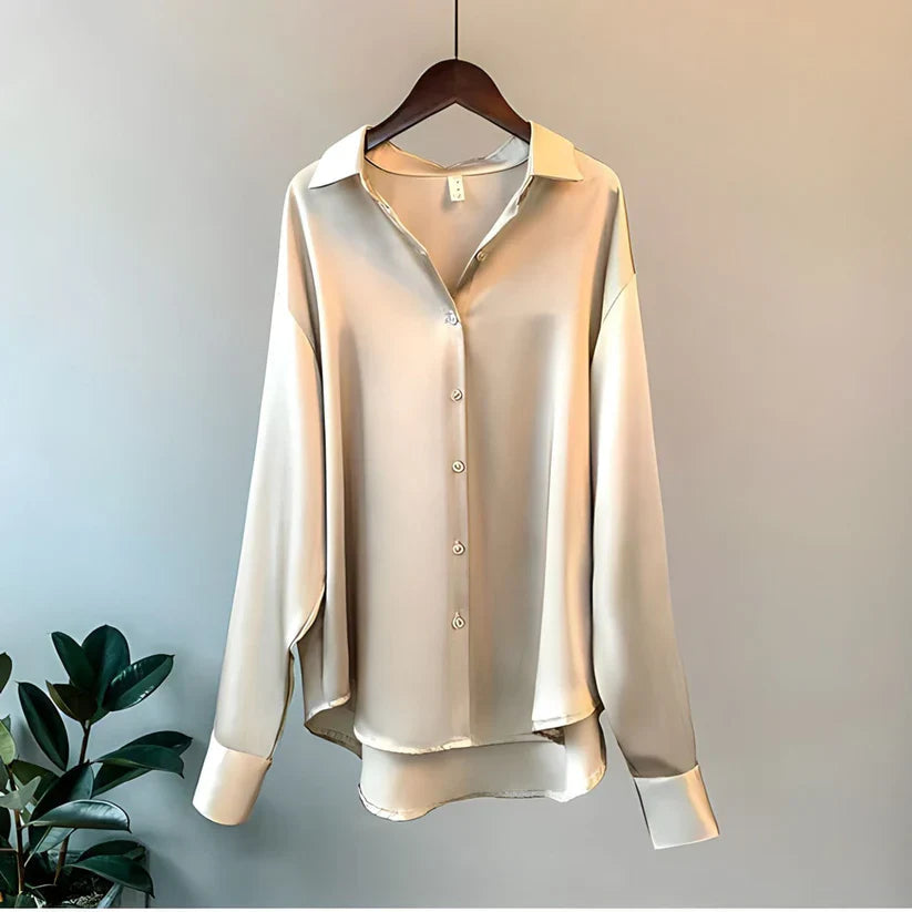 Women's long sleeve collared blouse with button front and curved hem