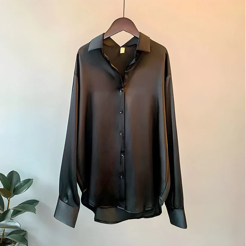 Women's long sleeve collared blouse with button front and curved hem