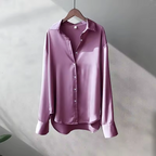 Women's long sleeve collared blouse with button front and curved hem