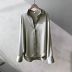 Women's long sleeve collared blouse with button front and curved hem