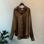 Women's long sleeve collared blouse with button front and curved hem