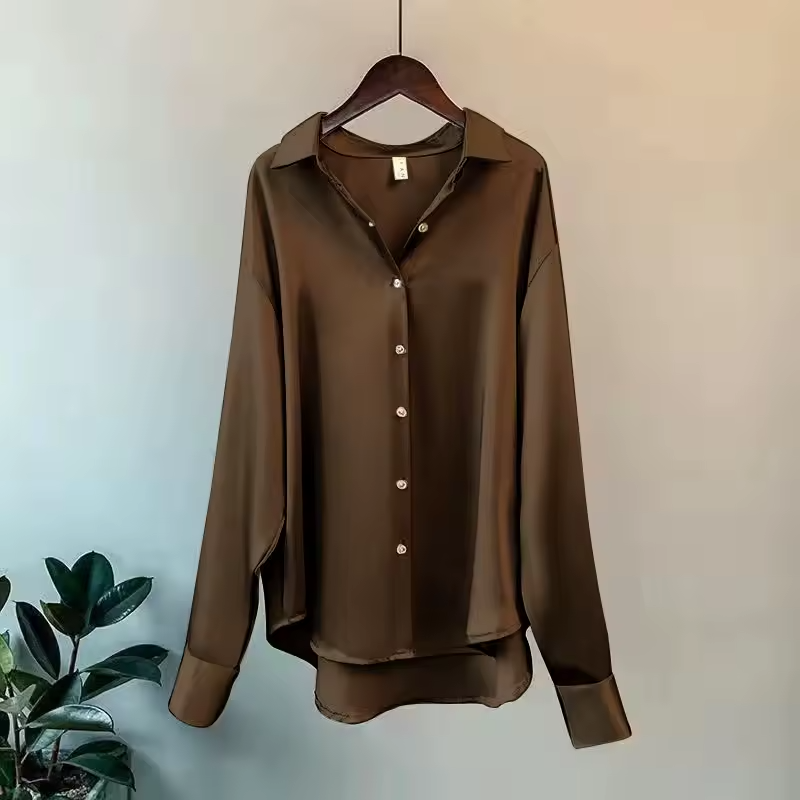 Women's long sleeve collared blouse with button front and curved hem