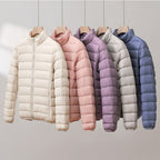 Women's quilted puffer jacket with high collar and long sleeves