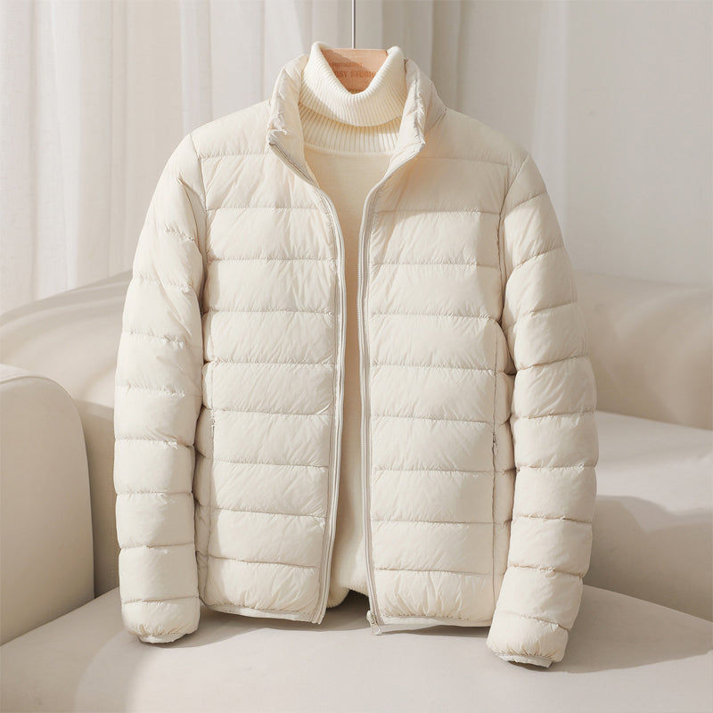 Women's quilted puffer jacket with high collar and long sleeves