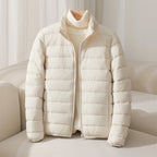 Women's quilted puffer jacket with high collar and long sleeves