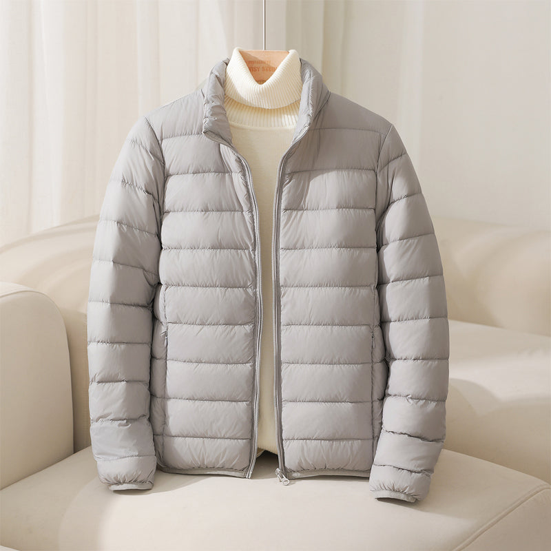 Women's quilted puffer jacket with high collar and long sleeves