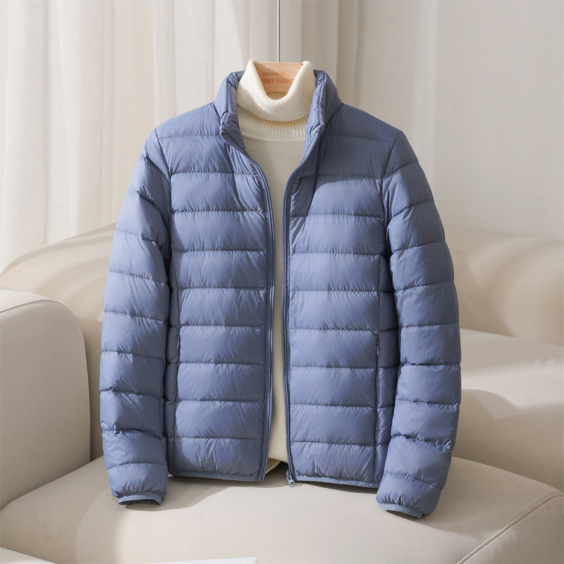 Women's quilted puffer jacket with high collar and long sleeves