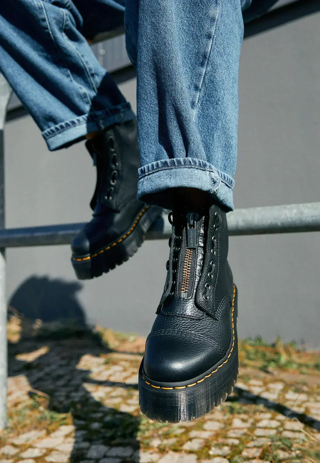 Black women's platform ankle boots with laces, side zip and chunky ridged sole