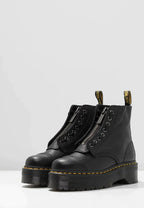 Black women's platform ankle boots with laces, side zip and chunky ridged sole