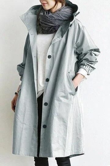 Women's hooded trench coat with button front and angled pockets