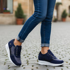 Women's low-top sneakers with laces, side zippers, metallic panels and white soles